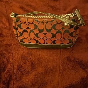Burgundy coach bag